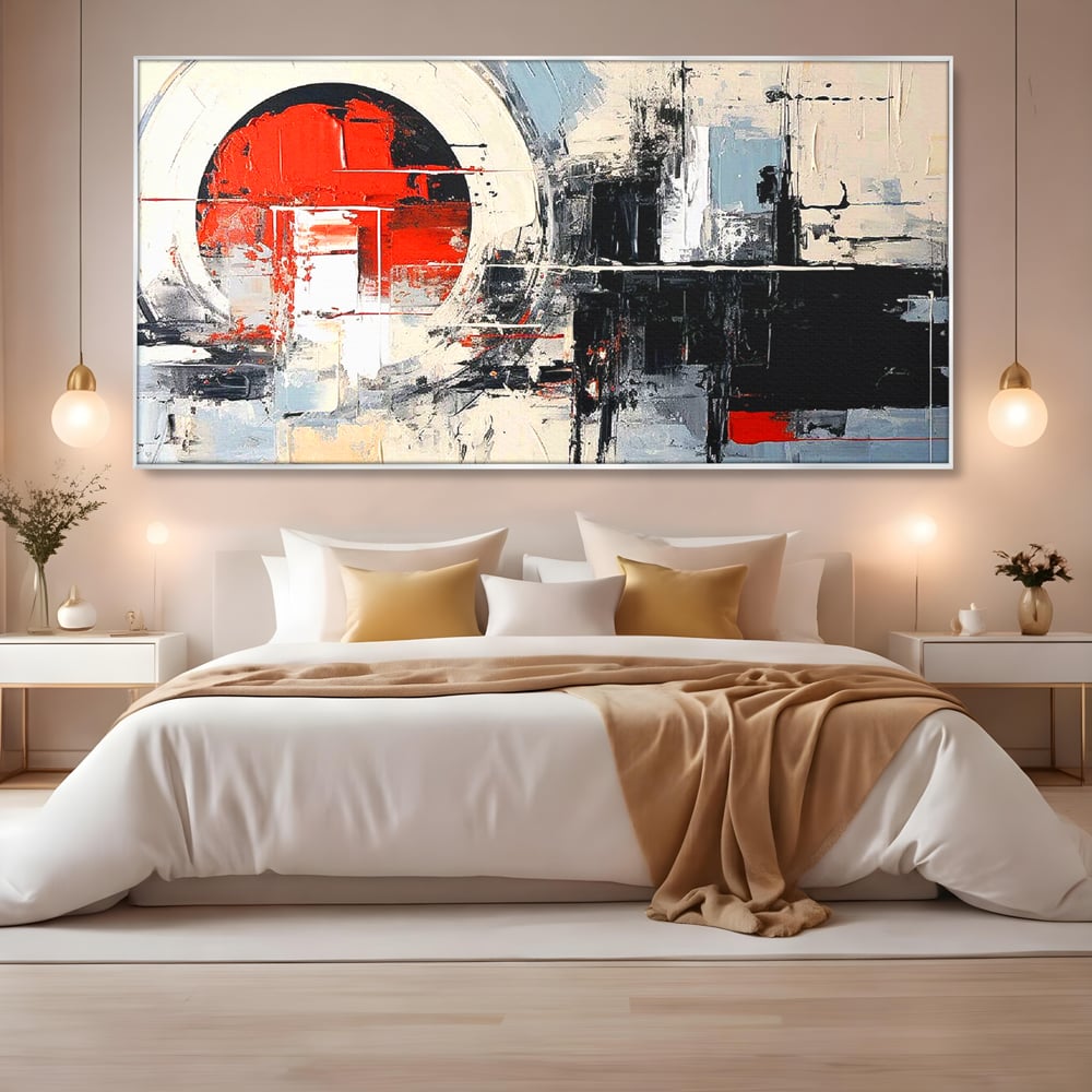 Tablou canvas cu tablou canvas cu cerc rosu si geometrie abstracta, in rama de aluminiu argintiu, pe perete intr-un dormitor